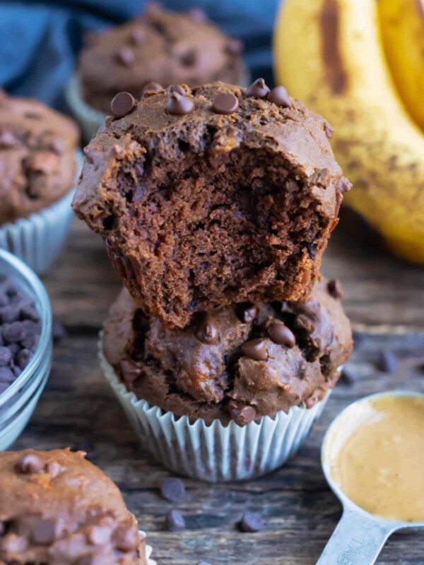 Learn how to make gluten-free Chocolate Banana Muffins with peanut butter, mashed banana, chocolate chips, and gluten-free flour.