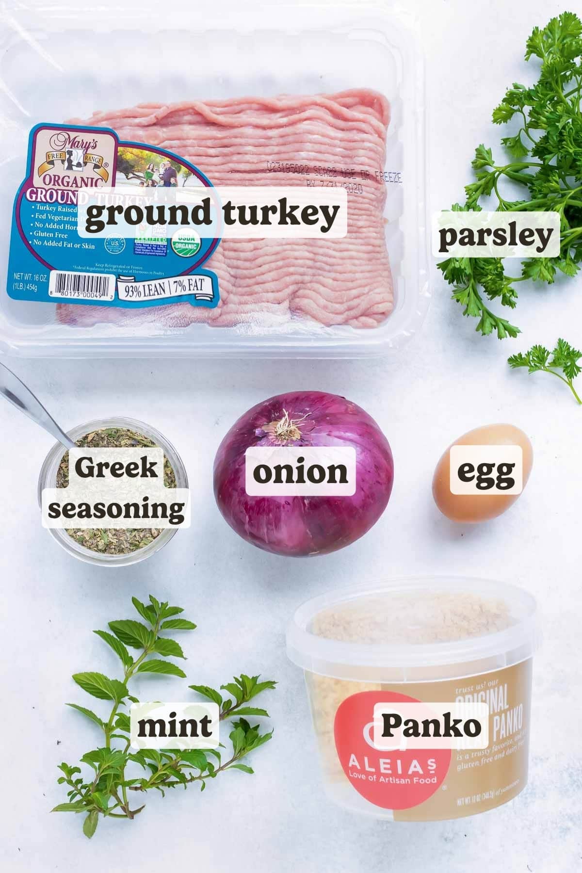 Ground turkey, onion, egg, fresh herbs, and seasonings are the ingredients for this Greek meatball dish.