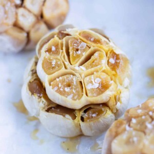 Flavorful roasted garlic is set on the counter before adding to recipes.