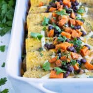 Healthy vegetarian enchiladas are served for a Mexican inspired dinner.