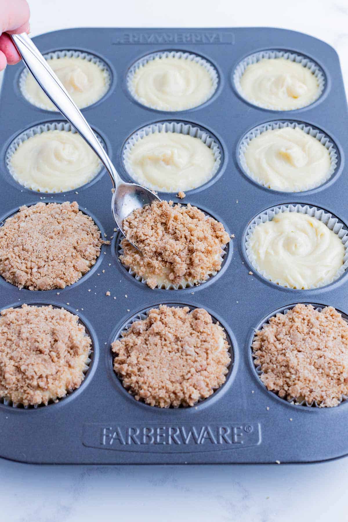 Each cupcake is topped with cinnamon streusel.