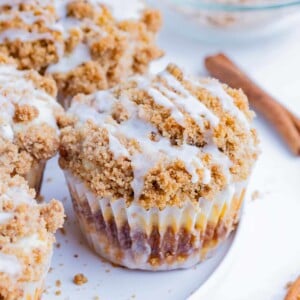 A tray of coffee cake cupcakes are served.
