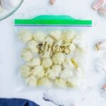 Frozen garlic cloves in a plastic bag.