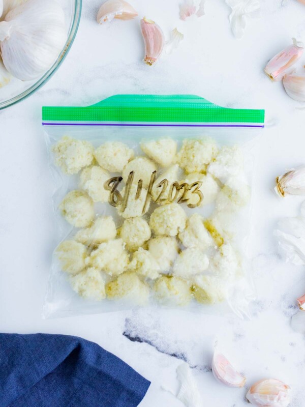 Frozen garlic cloves in a plastic bag.