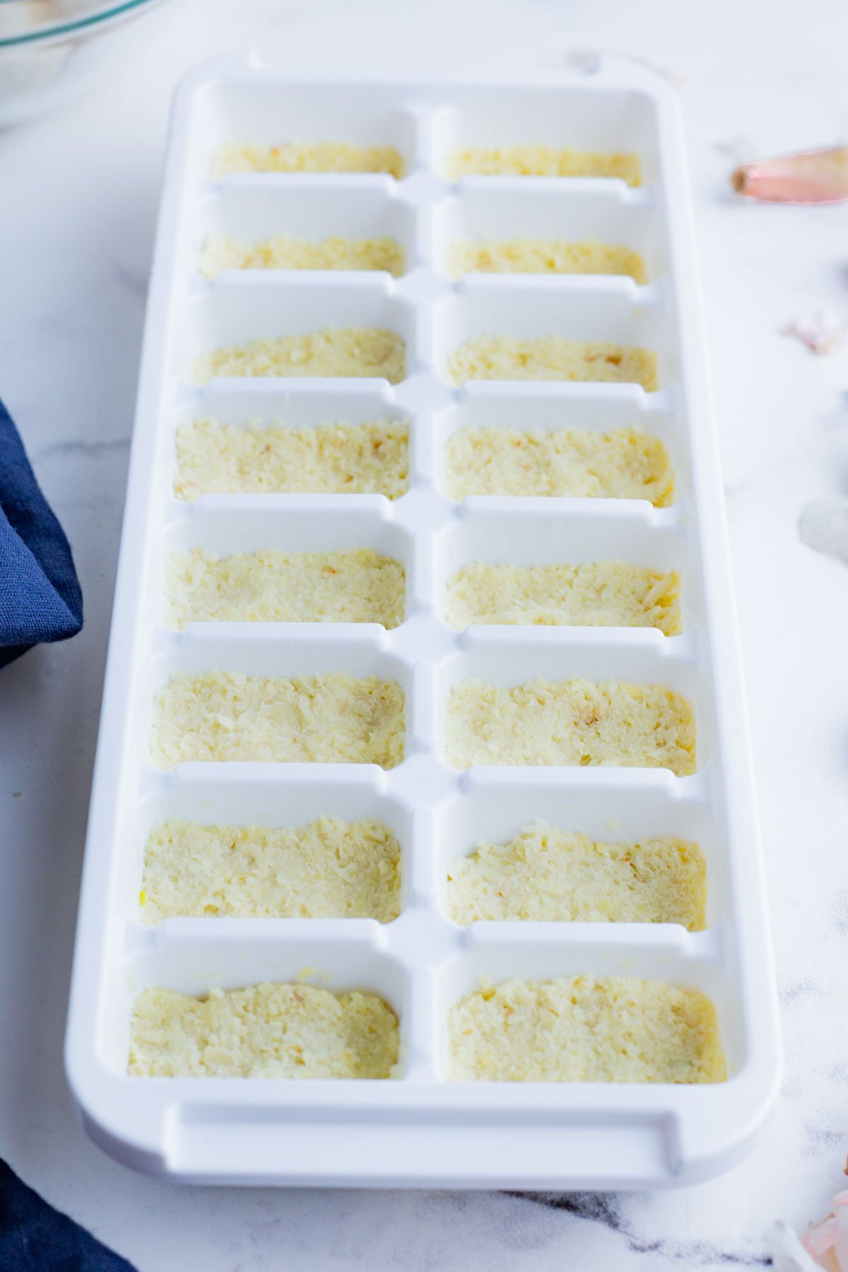 Frozen garlic in ice cube trays.