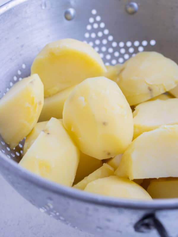 Boiled potatoes in a colander.