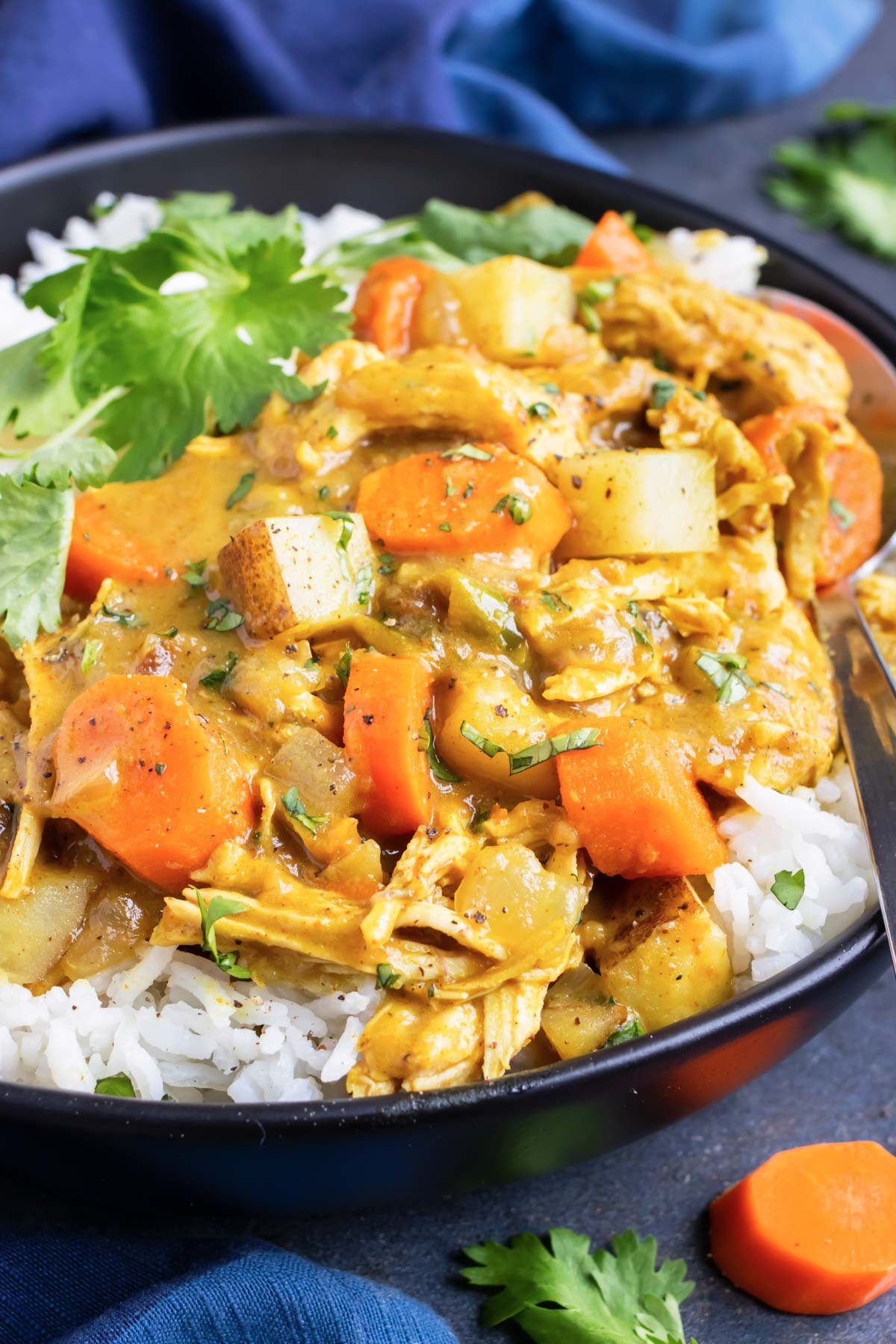 A healthy, easy, and Whole30 homemade chicken curry recipe with potatoes and carrots.