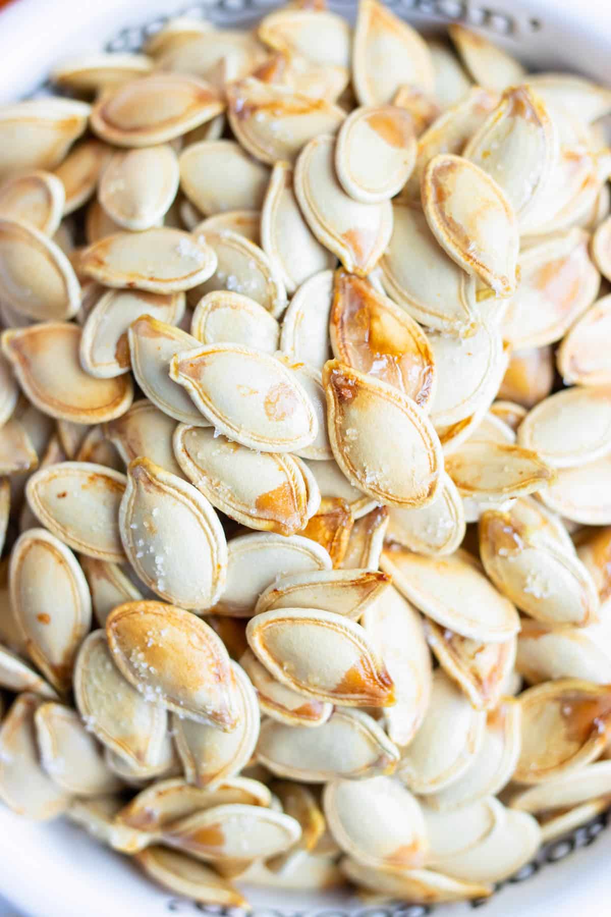 Roasted pumpkin seeds are baked with different seasonings.