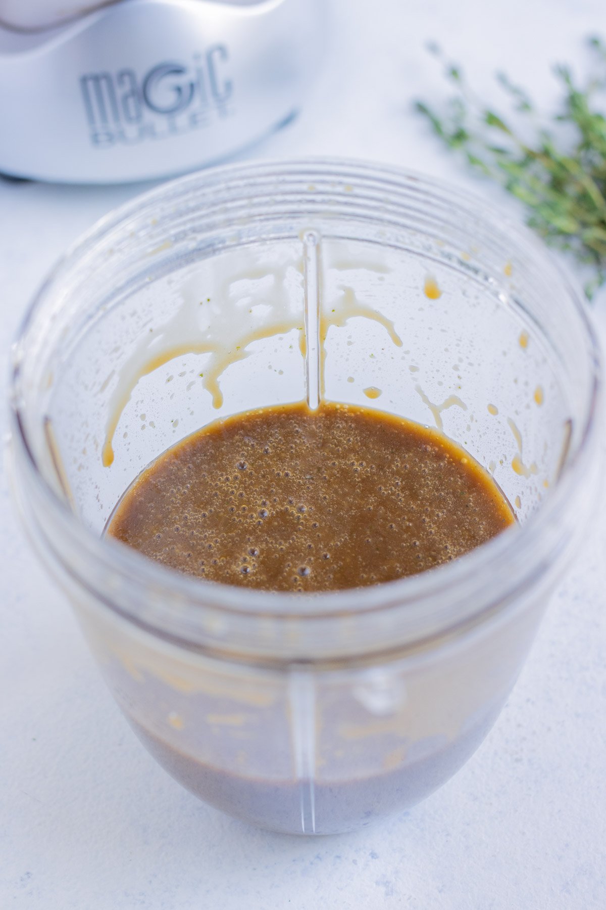Vinaigrette ingredients are mixed in a blender.