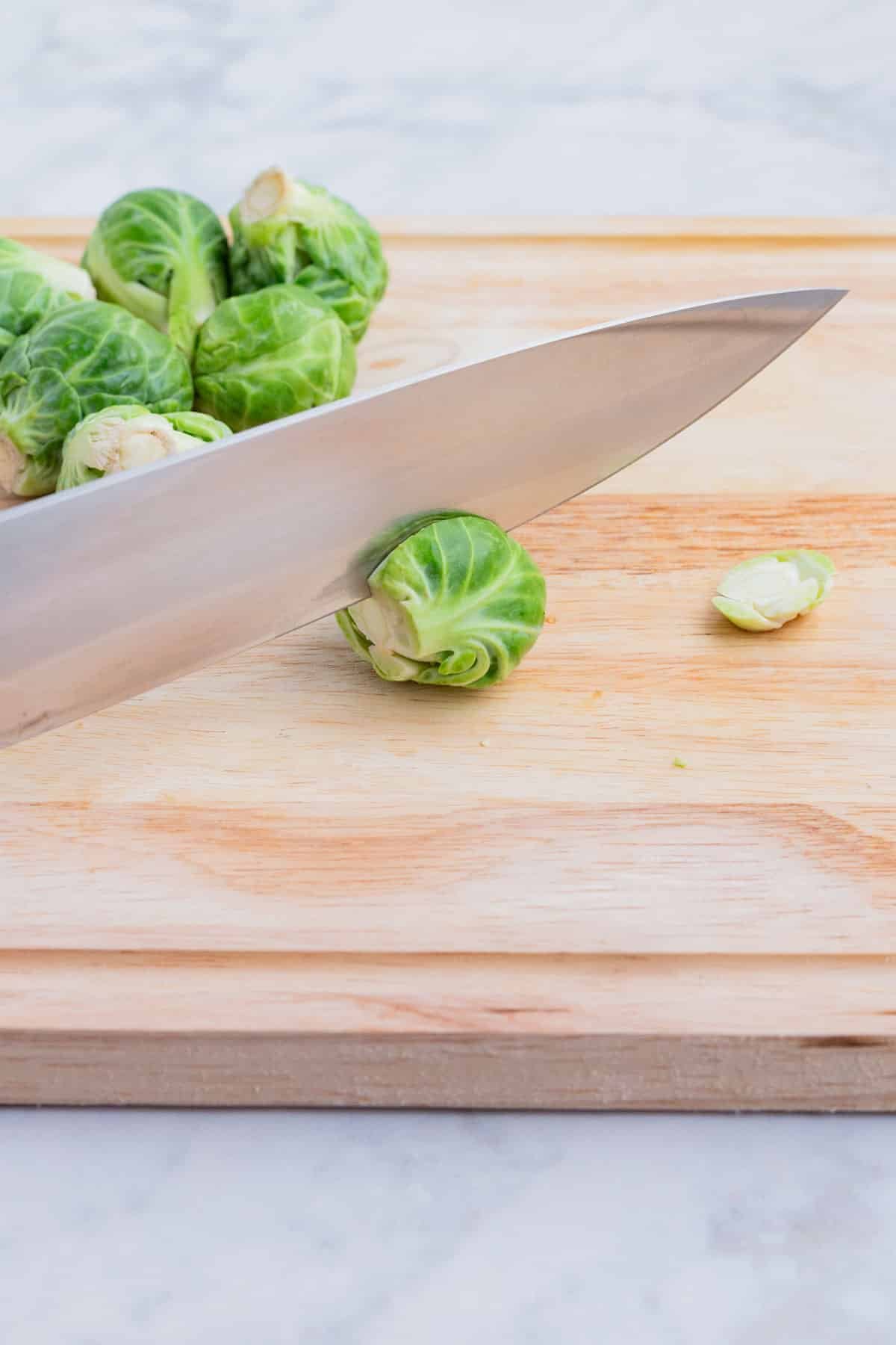 Larger sprouts are cut in half before cooking.