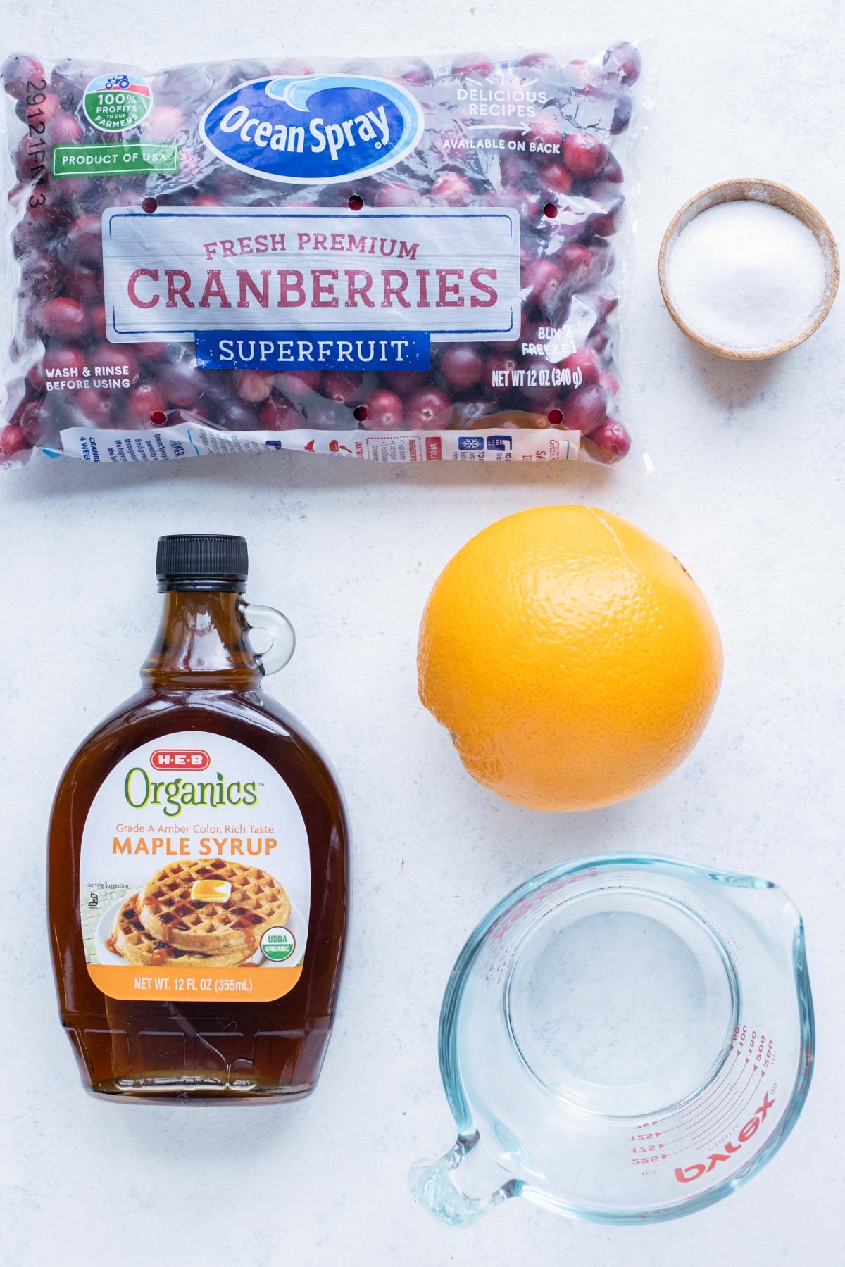 Maple syrup, orange, water, salt, and cranberries are the ingredients in this recipe.