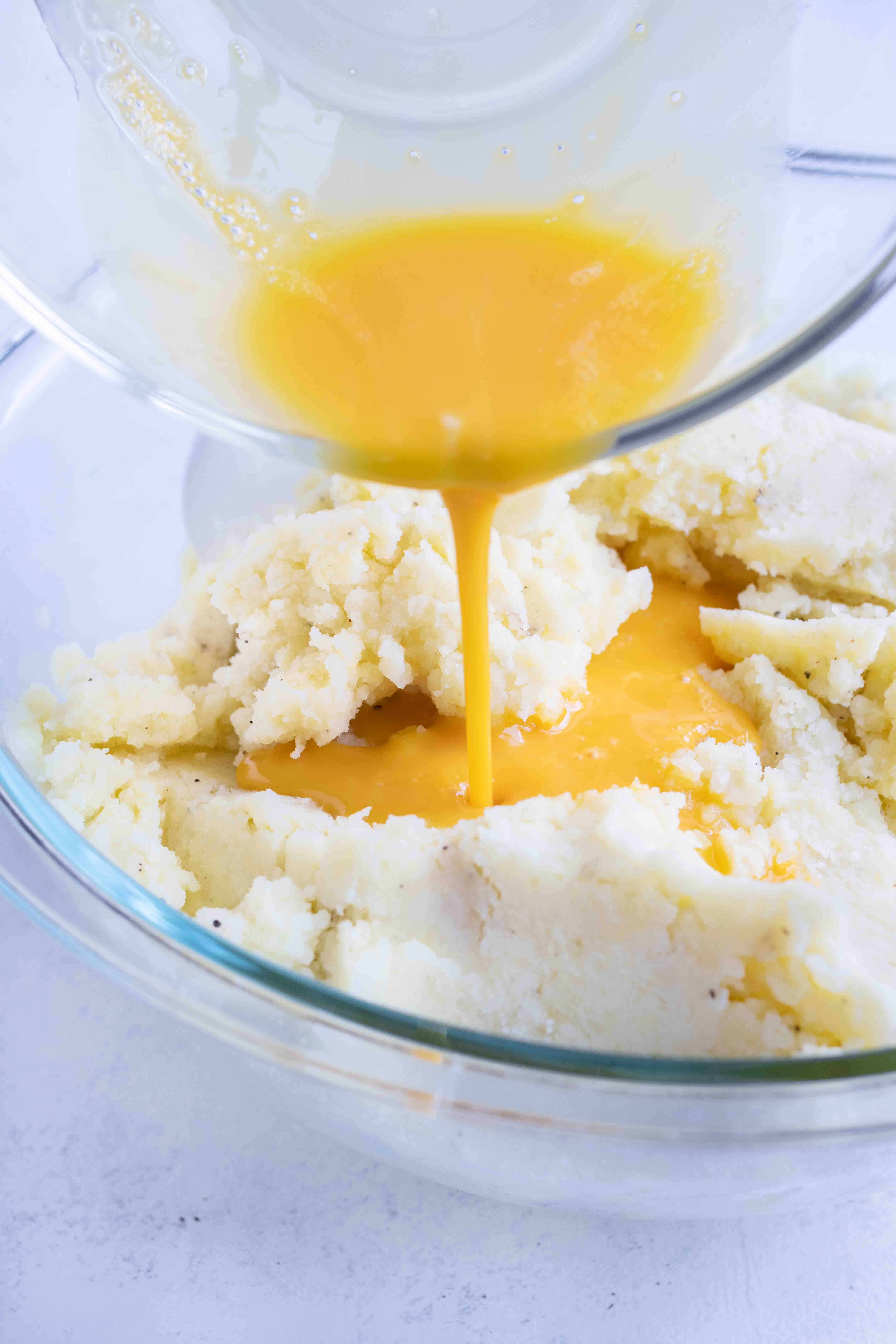 Egg yolks are added to the potato dough.
