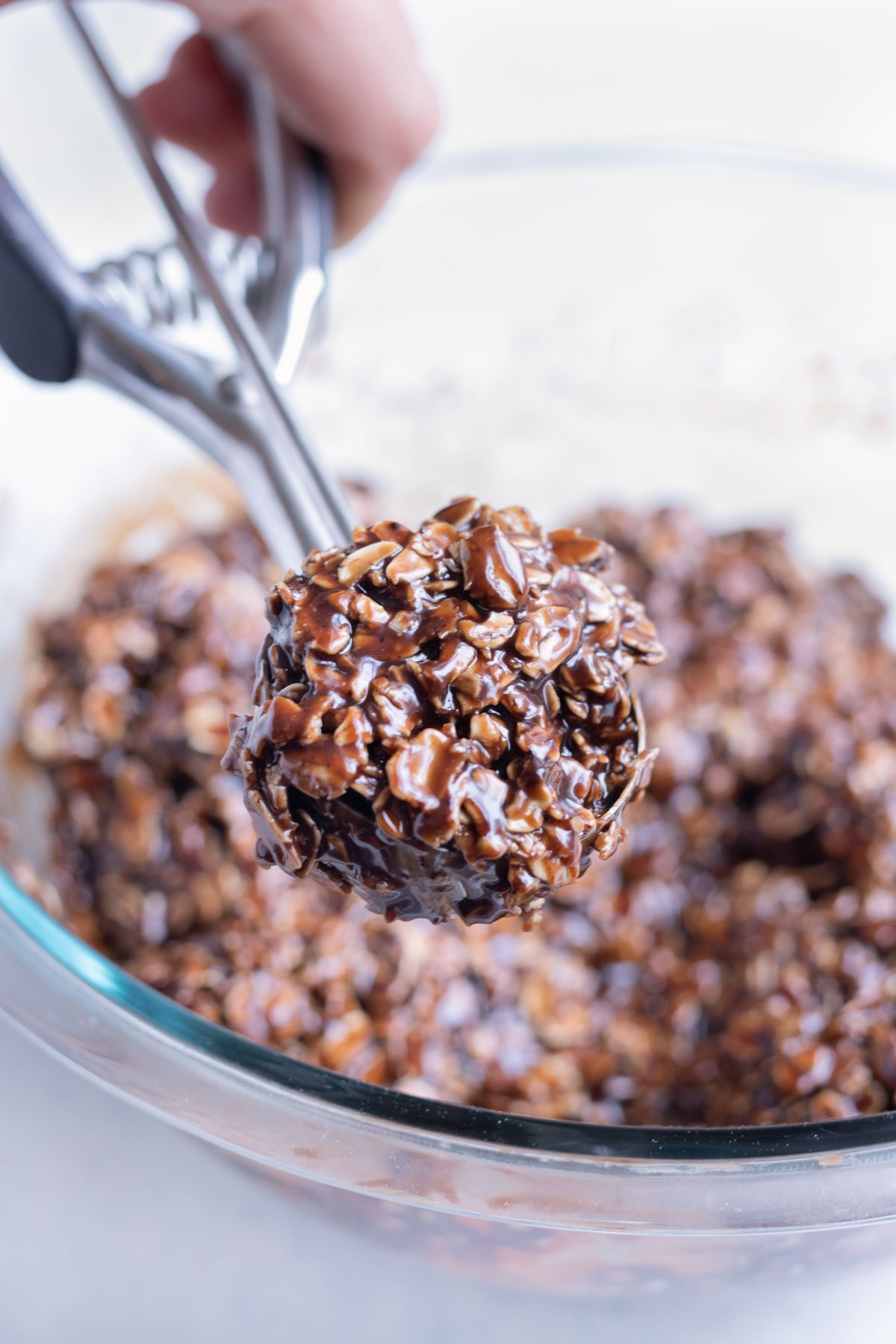 A cookie scoop is used to scoop the cookies.