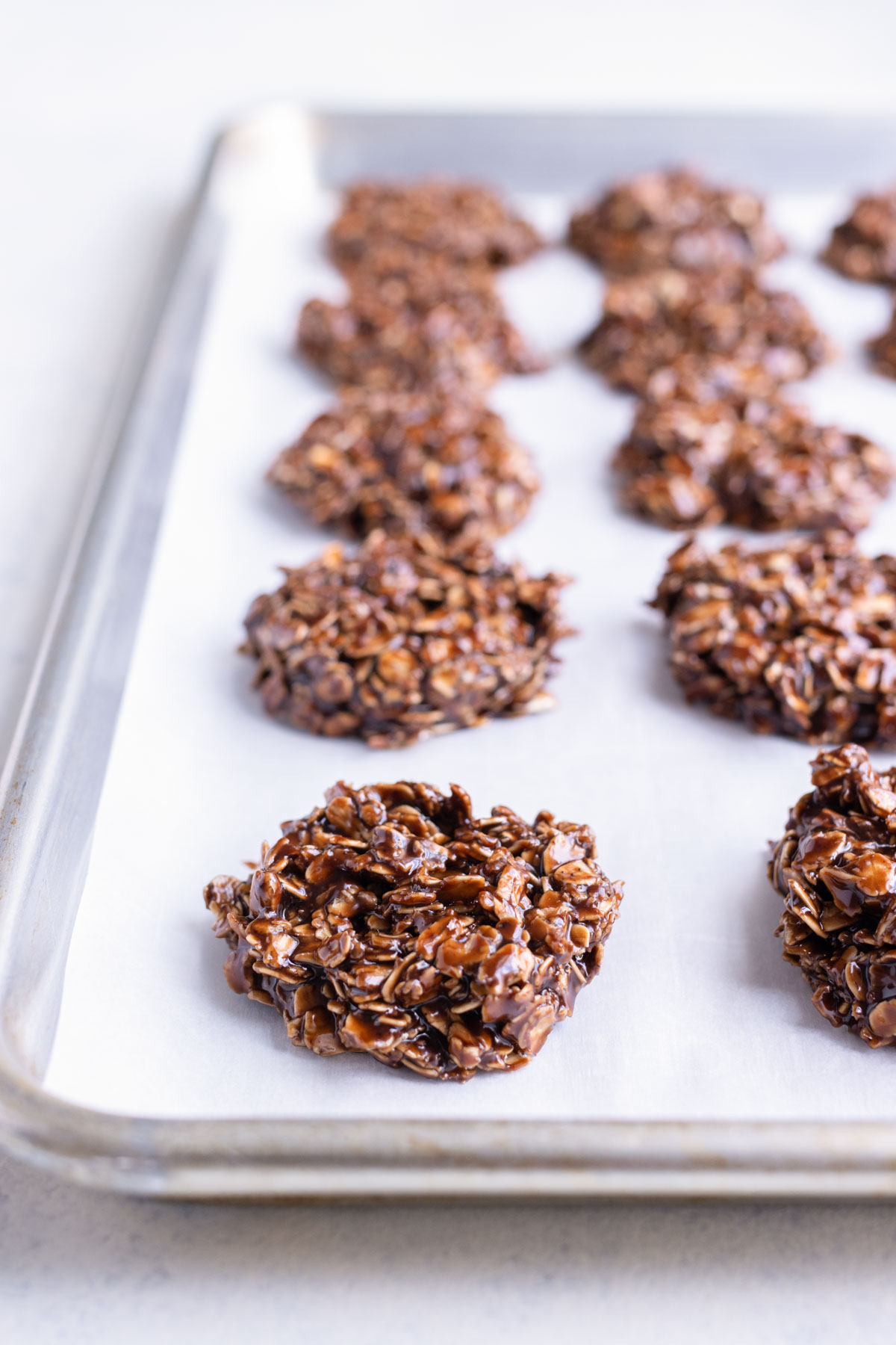 No-bake cookies are set on a baking sheet to set.