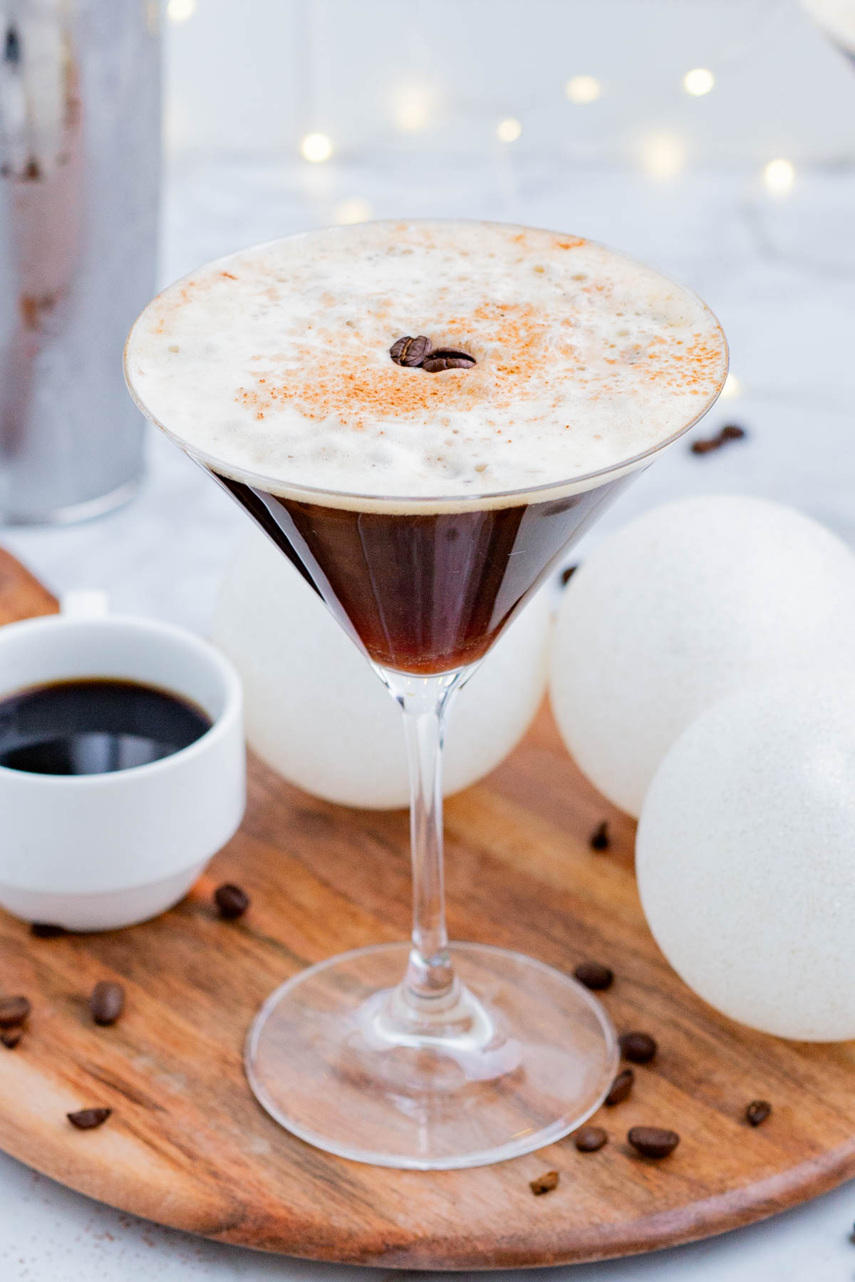 An espresso martini has a decadent foam top.