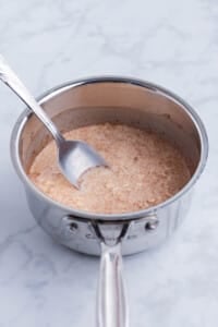 The oatmeal mixture is cooked.