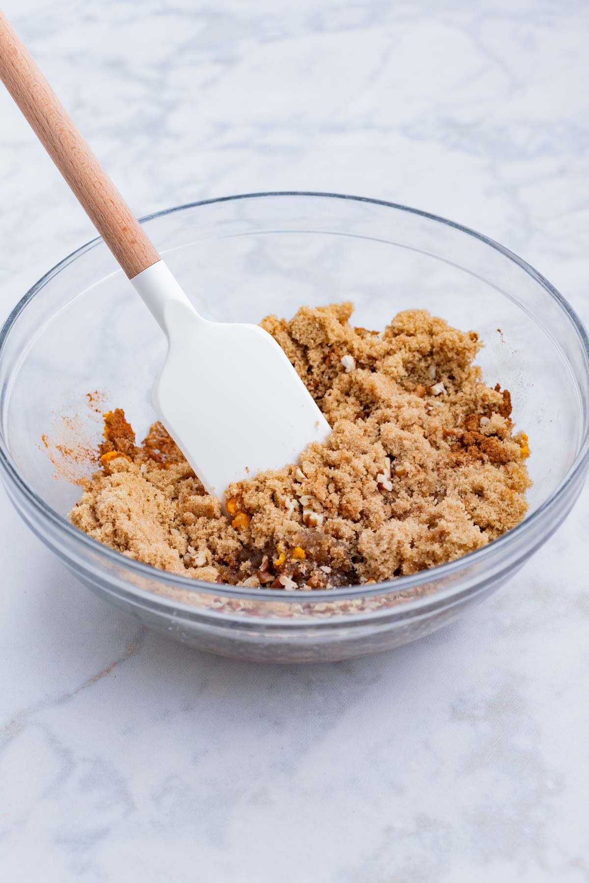 The filling is mixed up in a glass bowl.