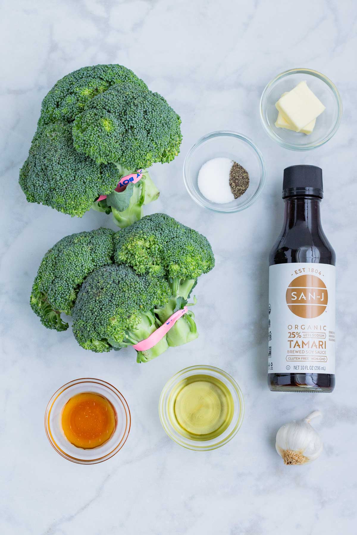 Broccoli, seasonings, oil, butter, and soy sauce are the ingredients for this recipe.