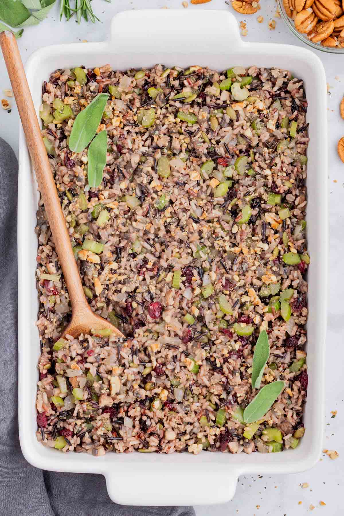 Wild rice stuffing is spread in a baking dish for a nice presentation.