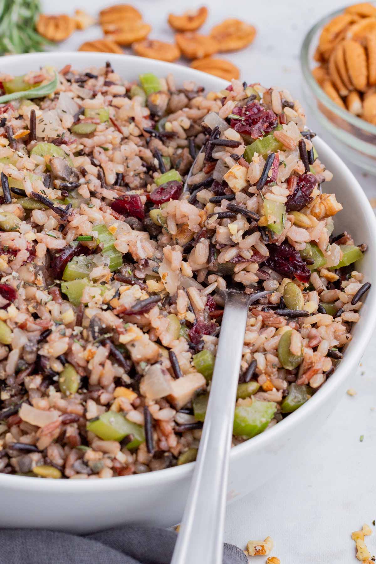Wild rice stuffing with fresh herbs, cranberries, and nuts is a great side dish.