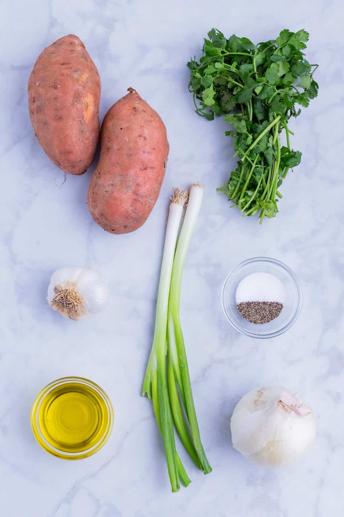 Sweet potato, green onion, cilantro, oil, and seasonings are the main ingredients for this dish.