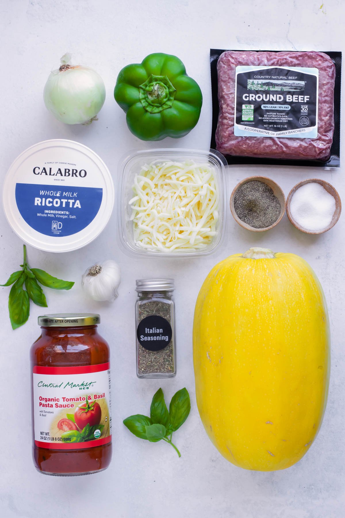 Spaghetti squash, ricotta, parmesan cheese, ground turkey, basil, tomato sauce, and other ingredients are used in this low-carb recipe.
