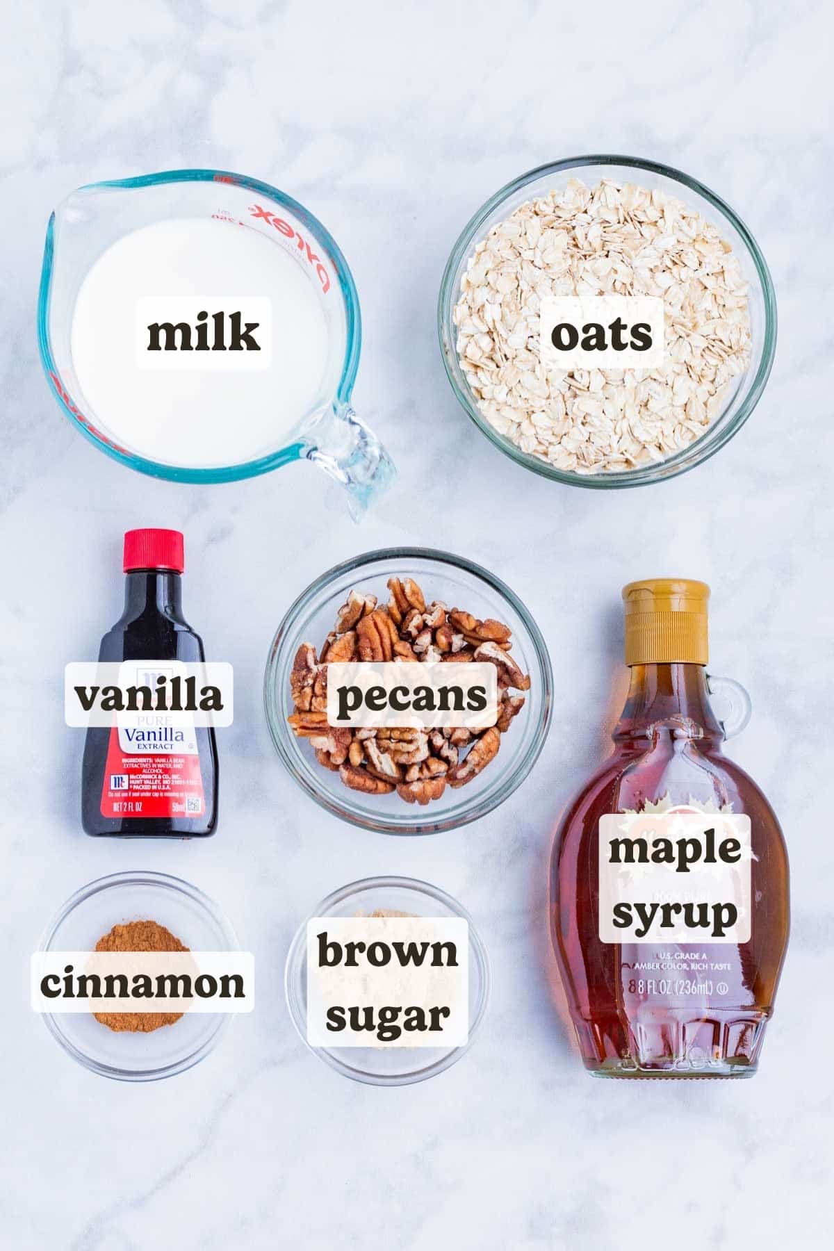Oats, brown sugar, milk, maple syrup, and pecans and the main ingredients for this overnight oats dish.