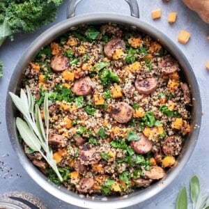 A one-pot dinner meal idea for sweet potatoes, quinoa, sausage, and kale.