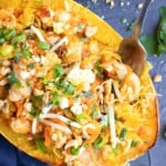 Spaghetti Squash Chicken Pad Thai with a fork placed inside.