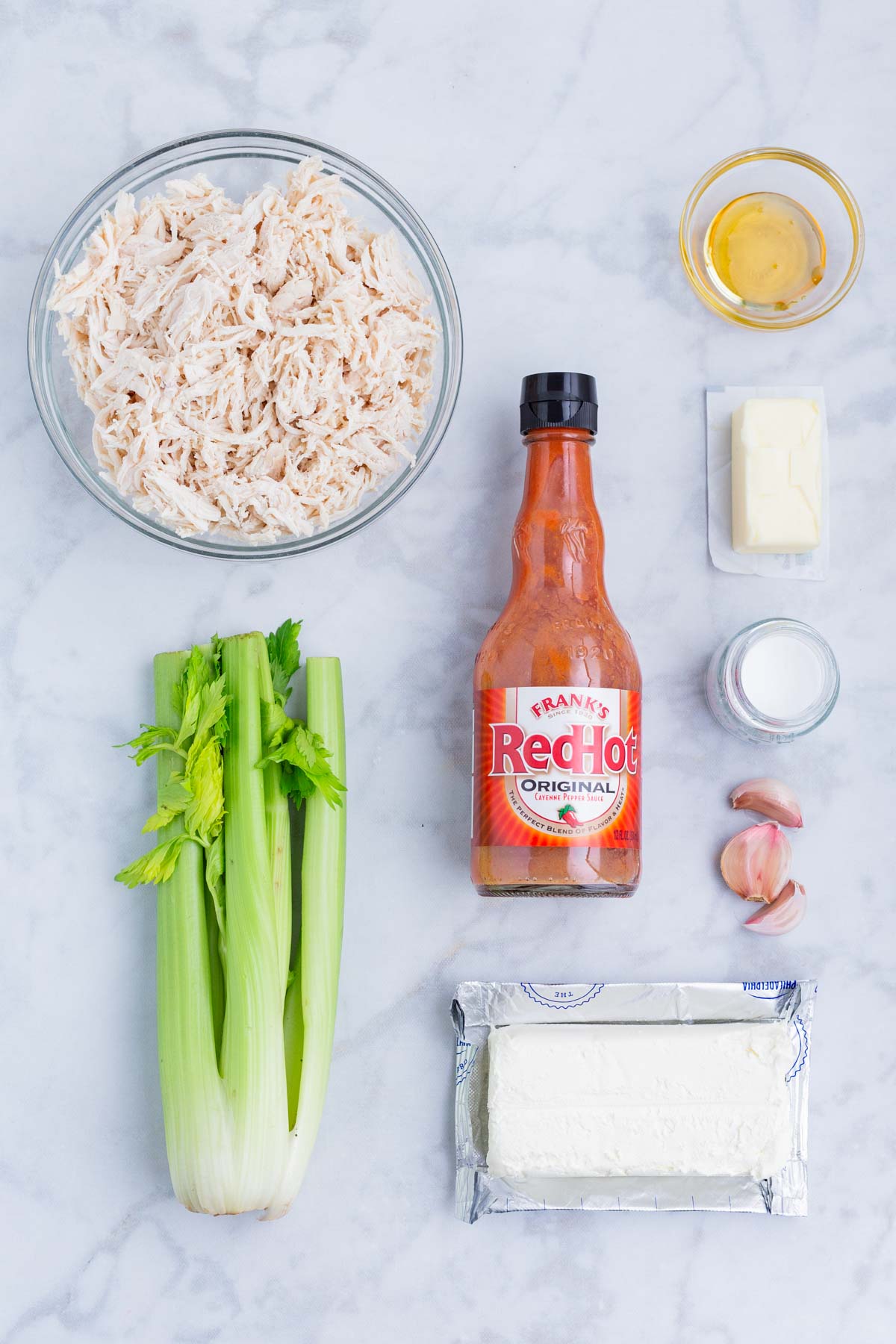 Buffalo sauce, chicken, cream cheese, seasonings, and celery are the main ingredients for this dish.