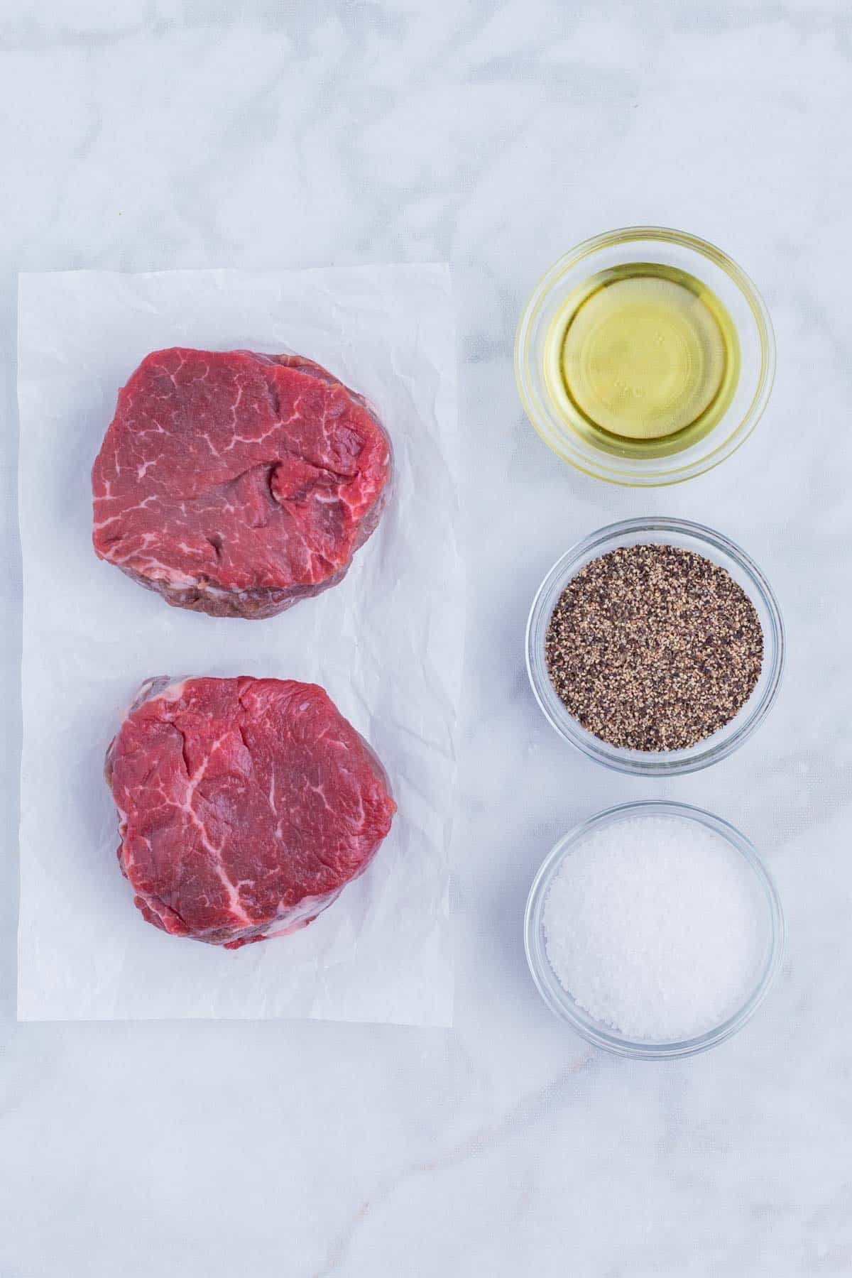 Filet steaks, salt, pepper, and oil are the only ingredients for this dish.