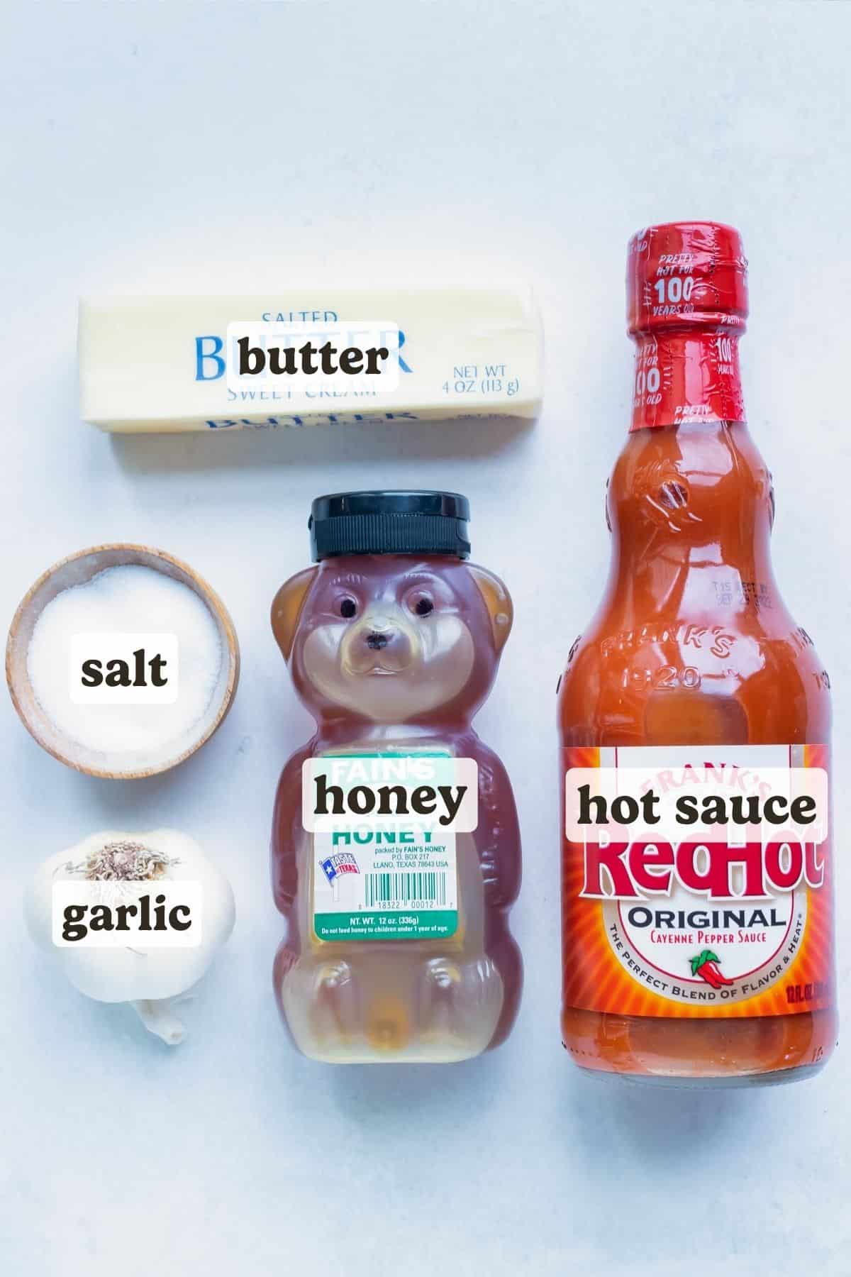 Butter, Hot sauce, honey, garlic, and salt are the ingredients used for this homemade buffalo sauce.