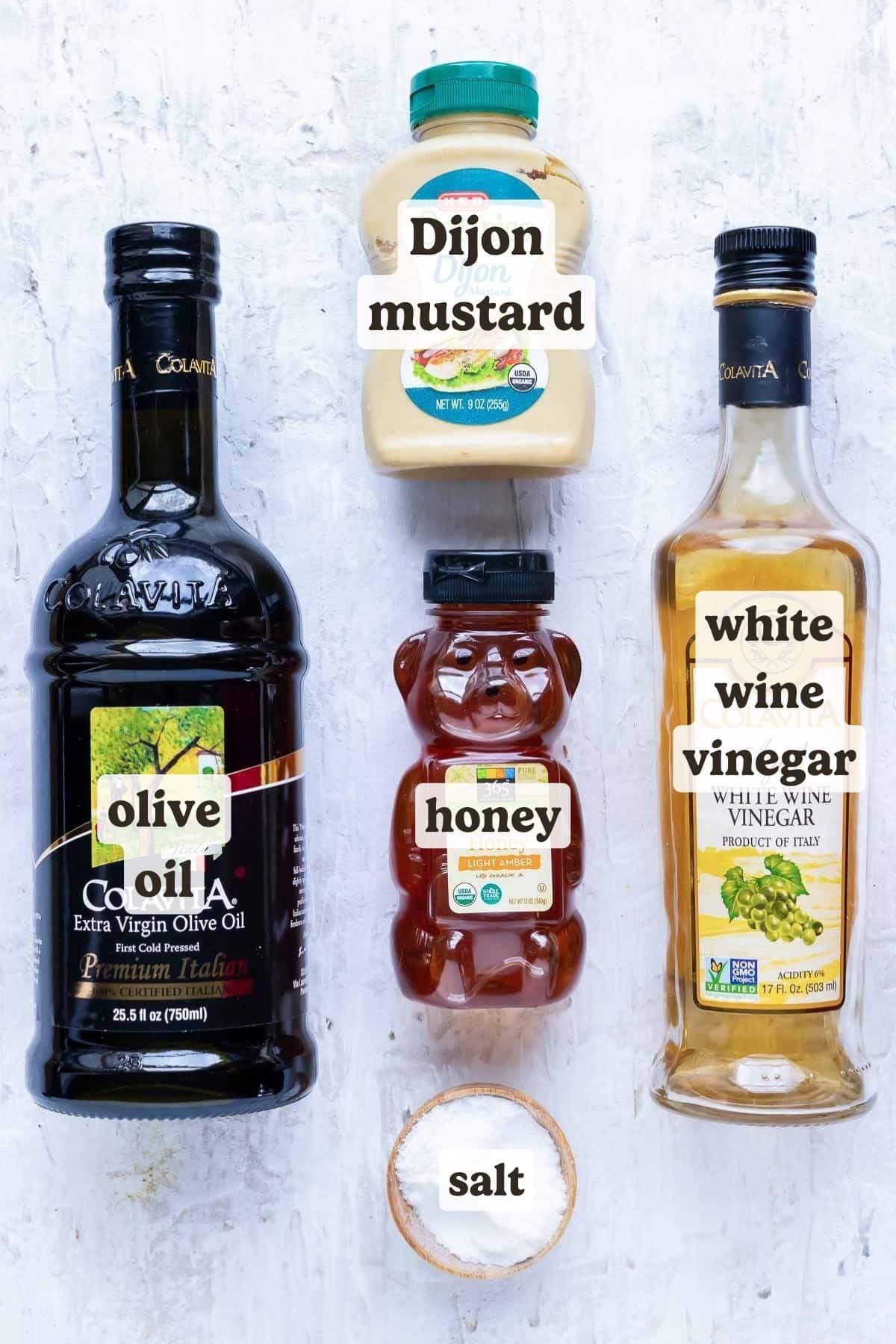 Honey, Dijon mustard, olive oil, vinegar, and salt as the ingredients for honey mustard.
