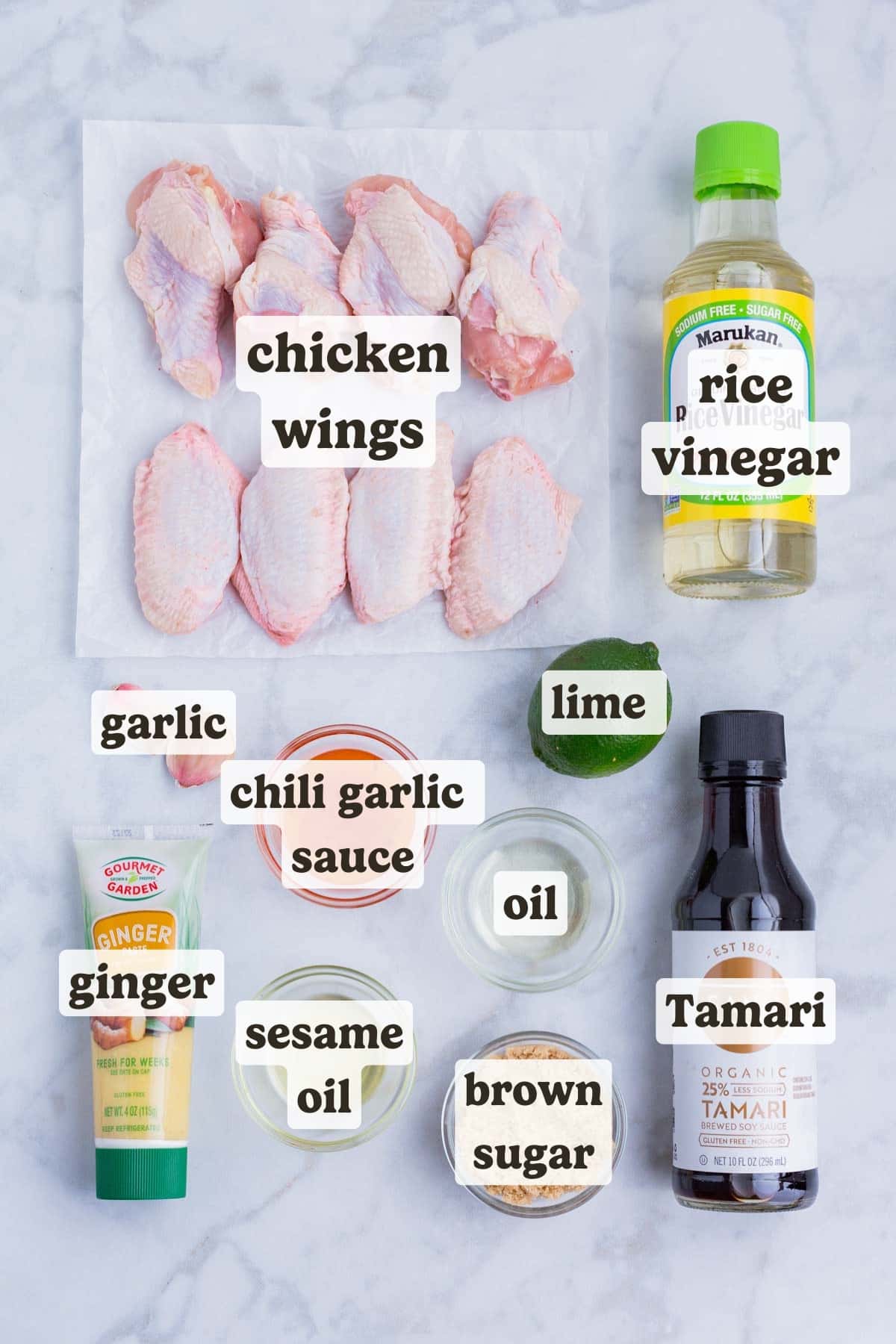 Chicken wings, soy sauce, ginger, garlic, vinegar, lime, and chili sauce are the main ingredients for this dish.