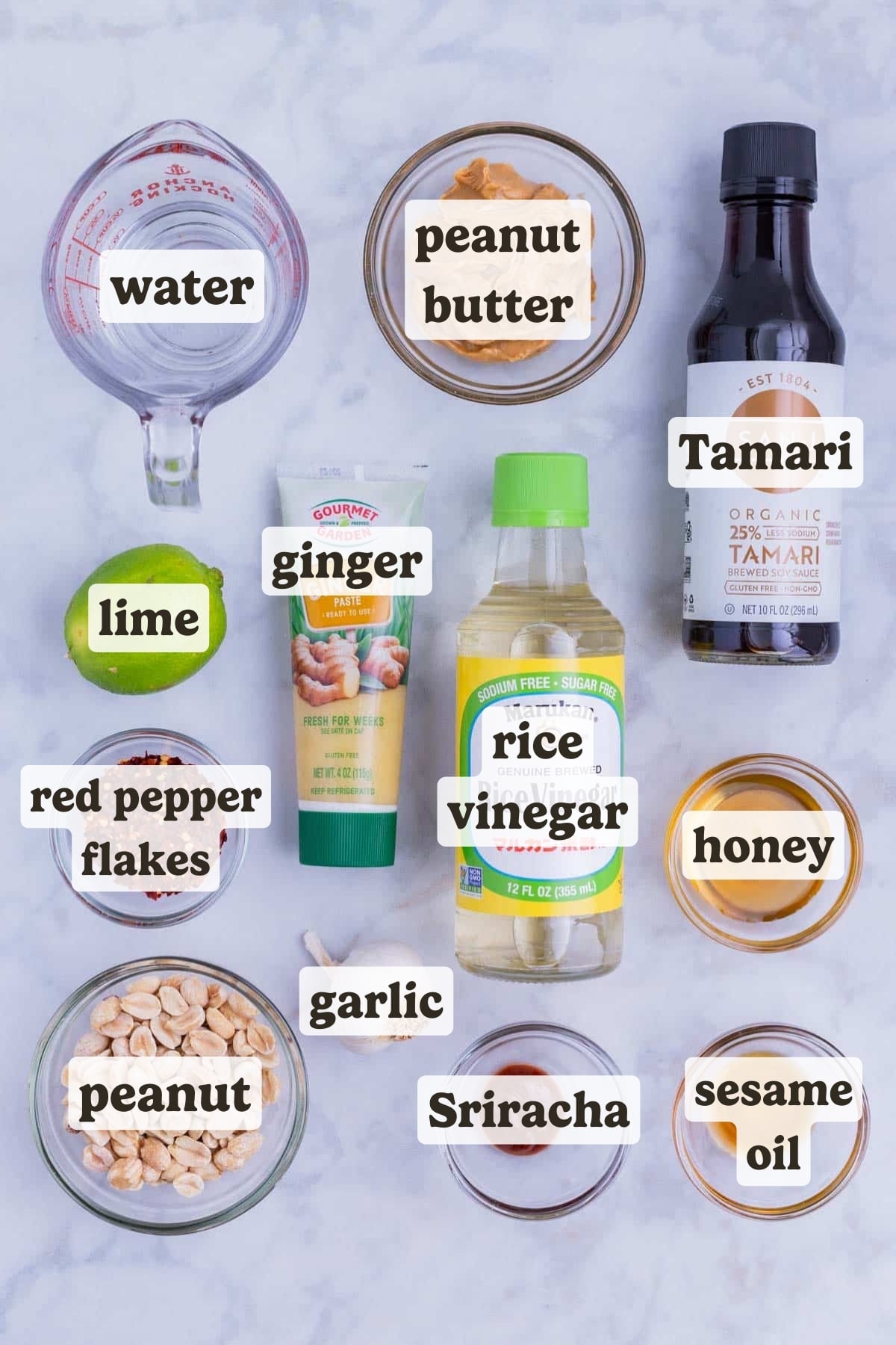 Peanut butter, soy sauce, sesame oil, vinegar, ginger, and garlic are the main ingredients for this peanut salad dressing recipe.