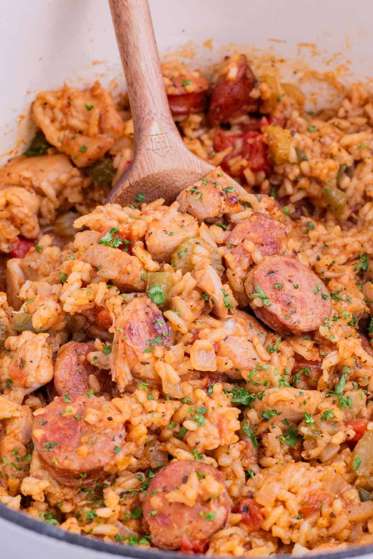 Jambalaya is filled with rice, chicken, and sausage and seasoned with Cajun spices.