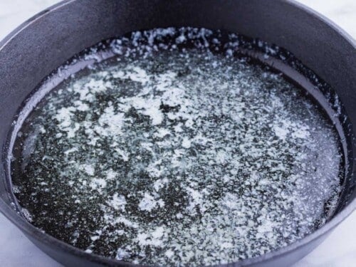 The butter is melted in a hot skillet in the oven.