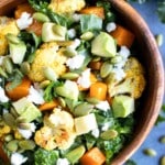 A roasted vegetable salad recipe with kale and cauliflower.
