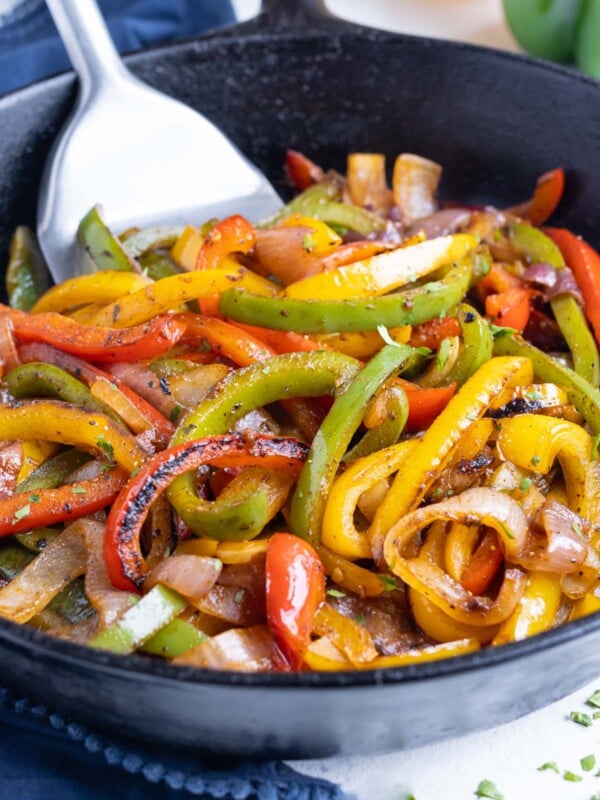 Fajita veggies are cooked in a cast-iron skillet to get a gorgeous char on the bell peppers and onions.