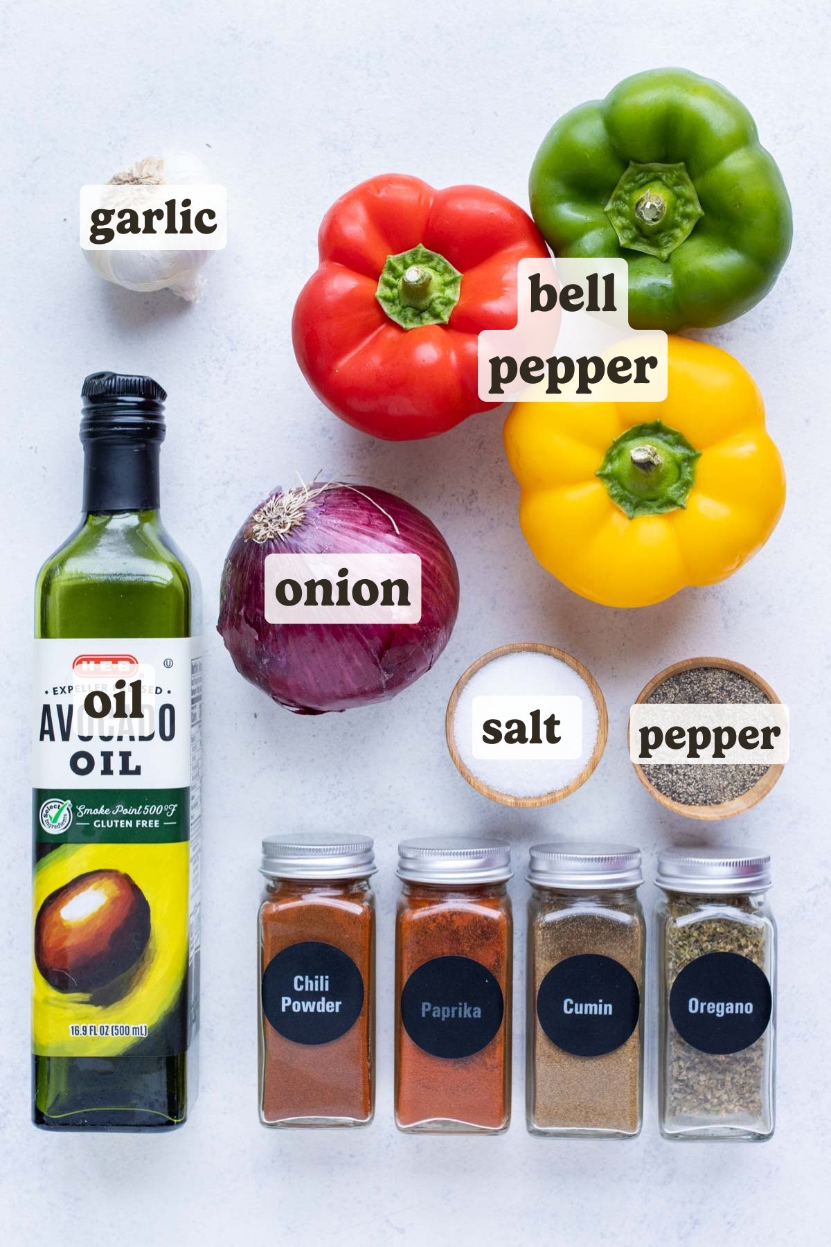 Fajita seasoning, bell peppers, onion, garlic, and oil are the ingredients for a fajita veggies recipe.