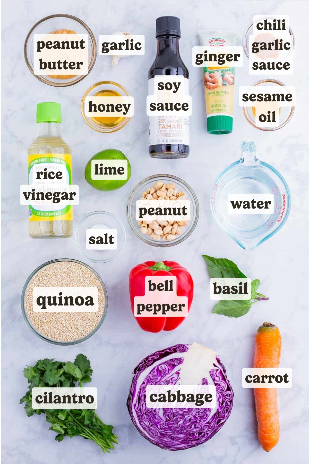 Fresh veggies, quinoa, herbs, peanuts, and peanut sauce ingredients are needed to make this quinoa salad dish.
