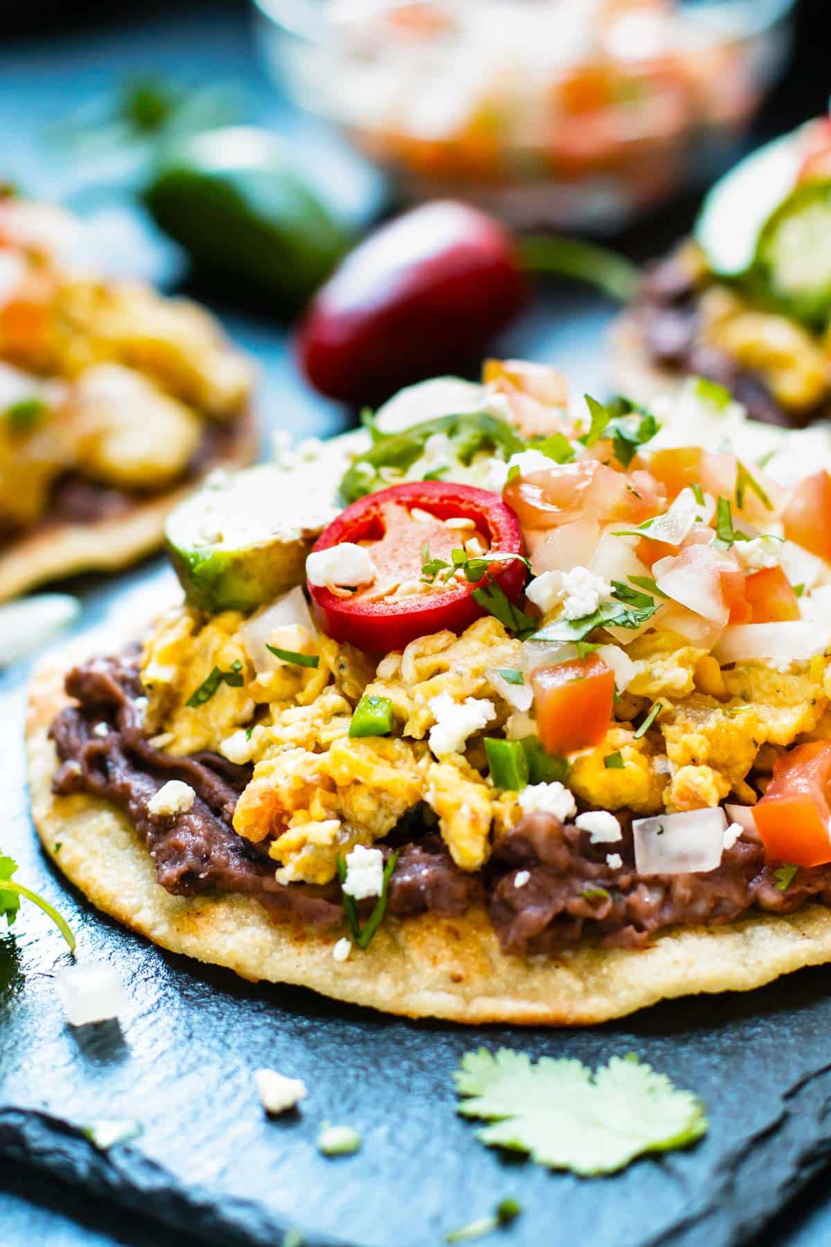 Gluten-free tostada recipe made with eggs and pico de gallo for a healthy lunch.