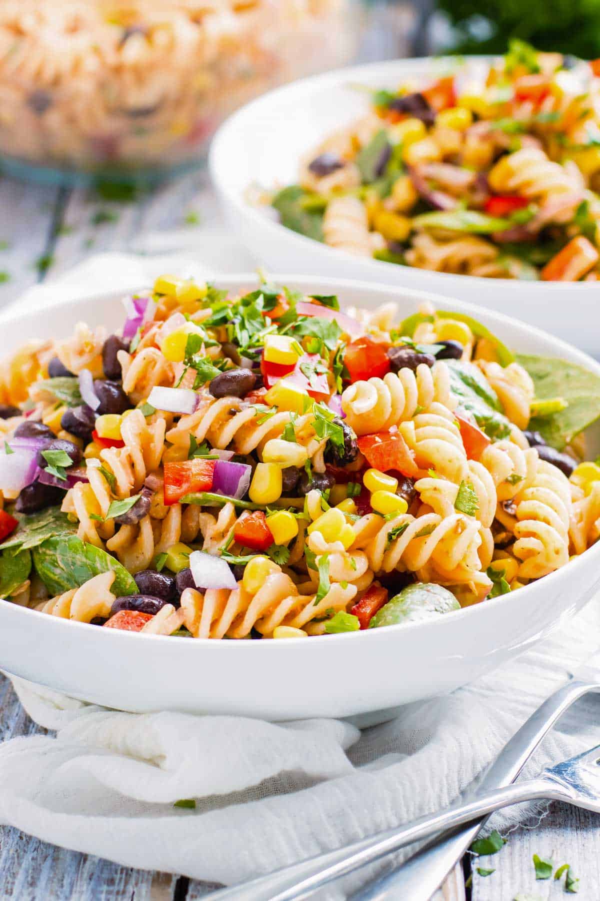 Two bowls of easy pasta salad with salsa and ranch for lunch.