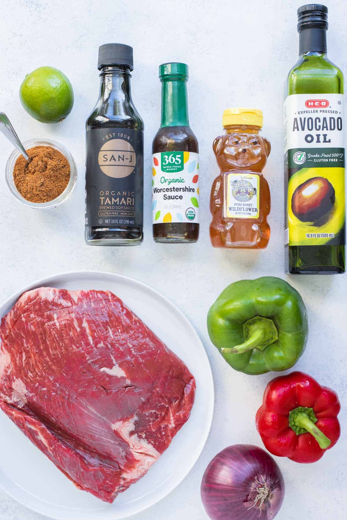 Steak, vegetables, honey, oil, lime juice, soy sauce, taco seasoning, and Worcestershire sauce are the ingredients in this recipe.