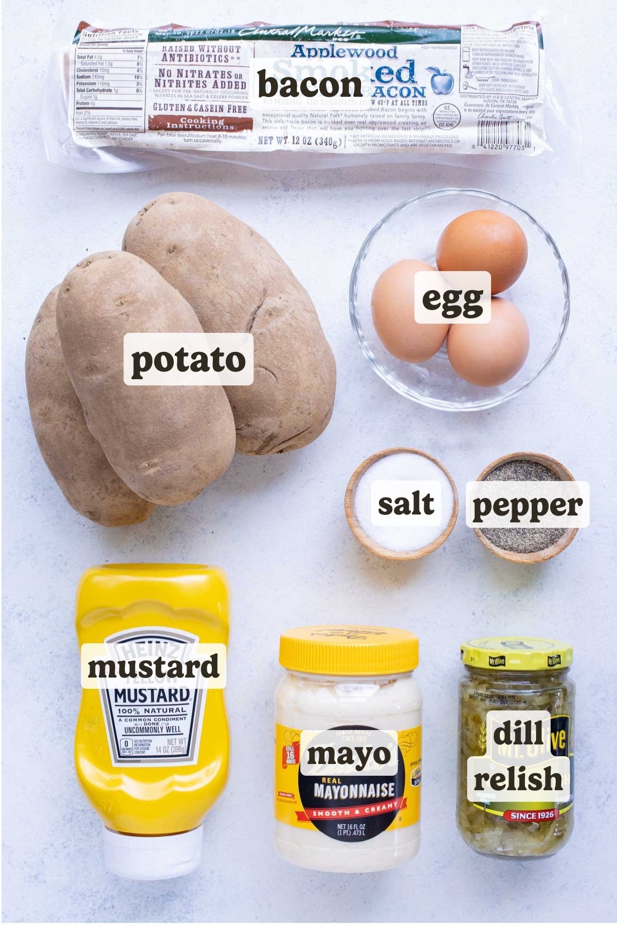 Potatoes, bacon, eggs, bacon, pickles, mustard, salt, pepper, and mayonnaise are the ingredients for this Instant Pot potato salad.