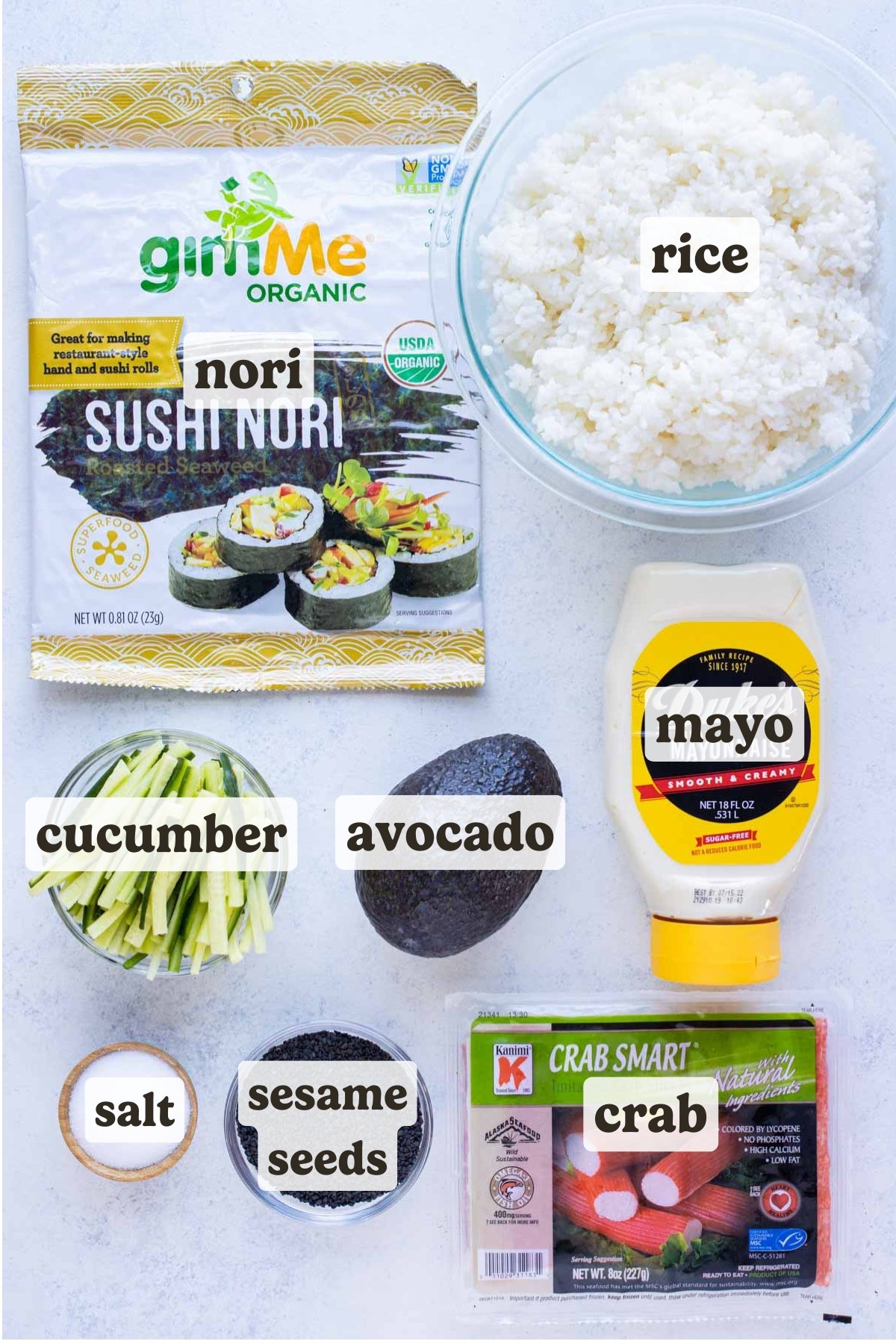 Nori, sushi rice, cucumber, avocado, crab meat, mayo, salt, and sesame seeds are the ingredients in this recipe.