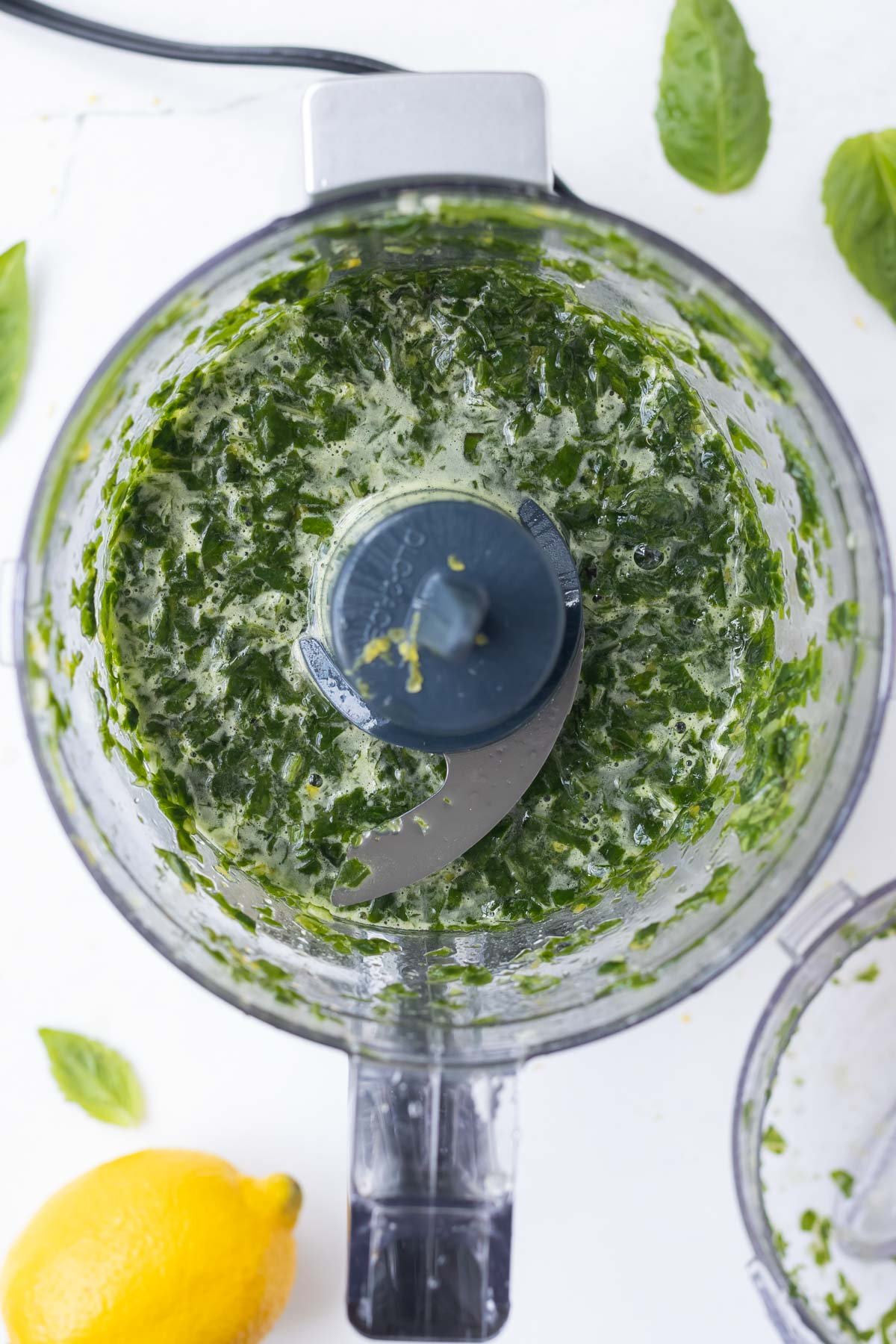 The ingredients are blended in a food processor.