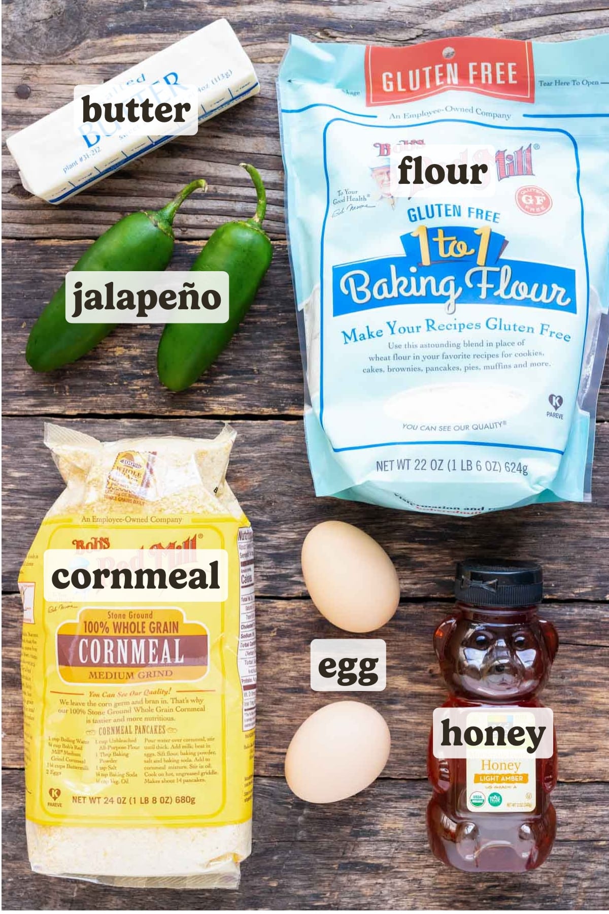 Cornmeal, gluten free flour, honey, jalapeños, and butter as the ingredients in a homemade cornbread recipe.
