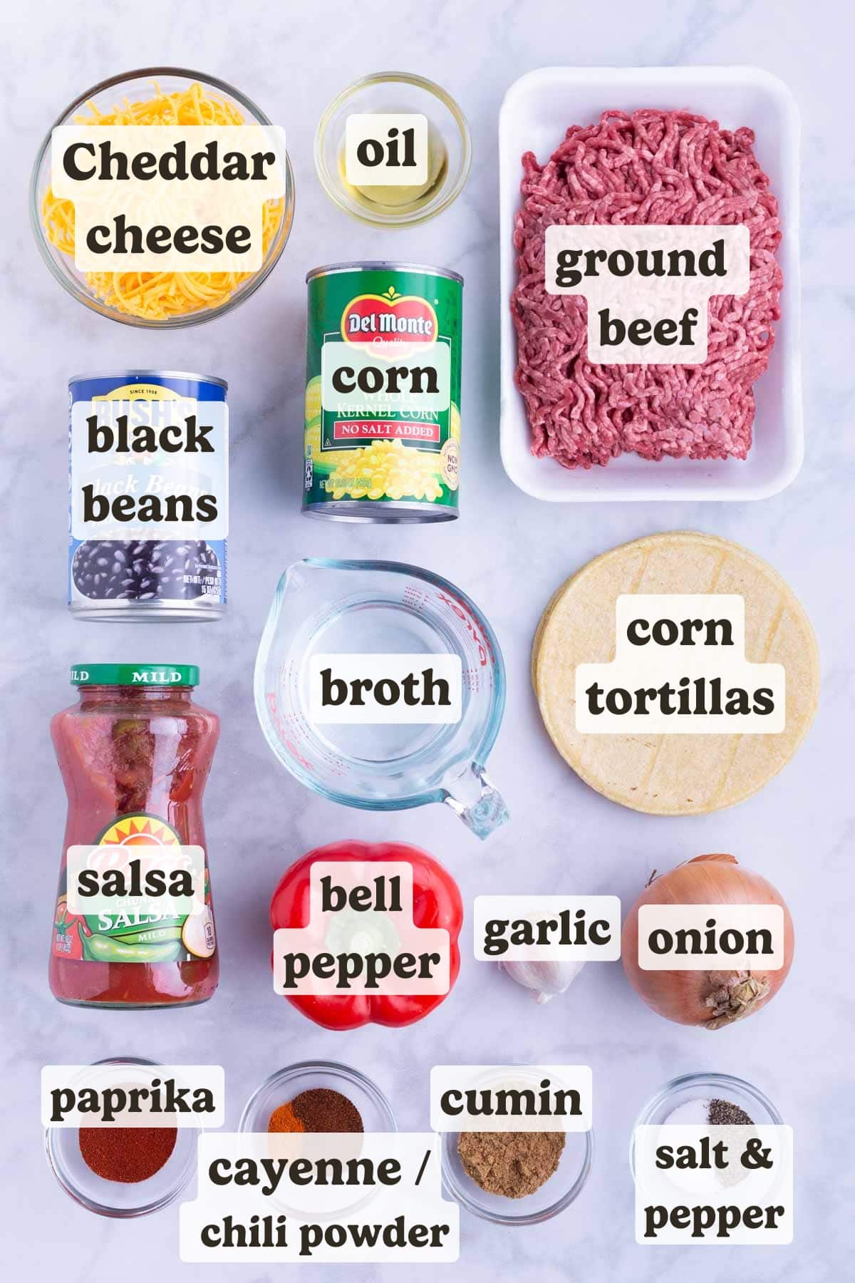 Ground beef, salsa, corn, beans, onion, bell pepper, and seasonings are the main ingredients for this beef taco skillet dish.