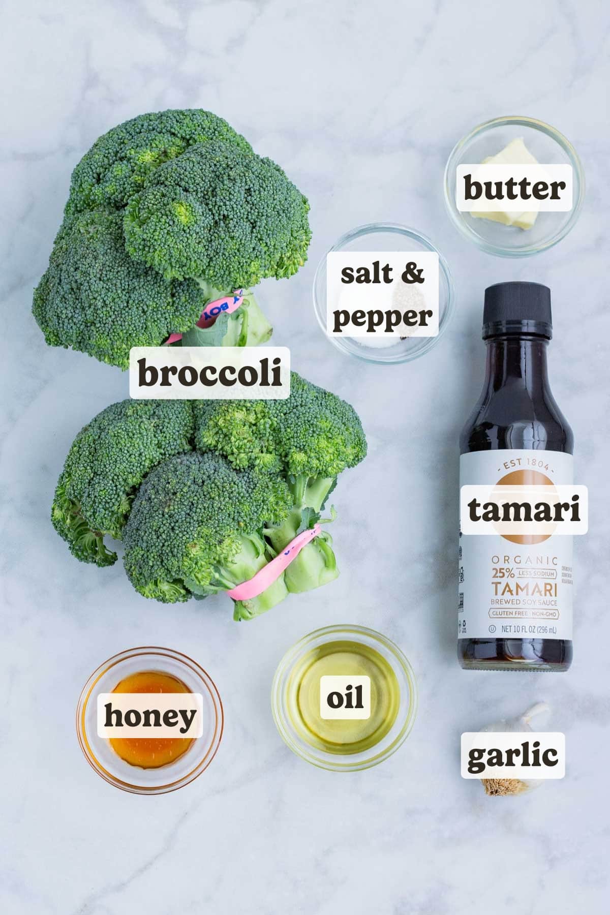 Broccoli, butter, soy sauce, honey, oil, garlic, salt, and pepper are the ingredients for this honey roasted broccoli recipe.